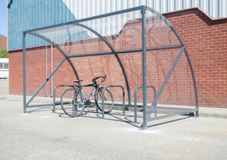 Echelon cycle storage shelters with 4 Place Rings and clear glazing