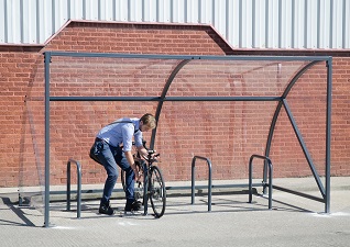 Echelon™ Cycle Shelter in use complete with bike rack at industrial site