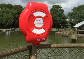 Guardian™ Lifebuoy Housing post mounted with life ring and rope at water treatment plant