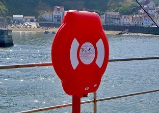 The highly visible Guardian lifebuoy housing protecting the life-saving device inside from harmful UV degradation