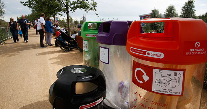 clear bins with multiple waste streams at an event