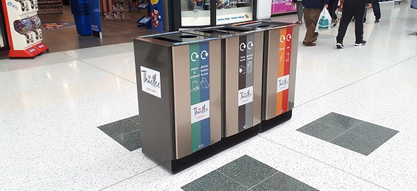 Personalised recycling bins in a shopping centre