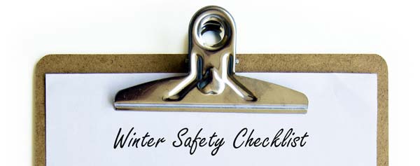Winter safety checklist written on a clipbaord