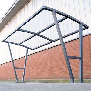 Cadence Cycle Shelter fixed outside of a building