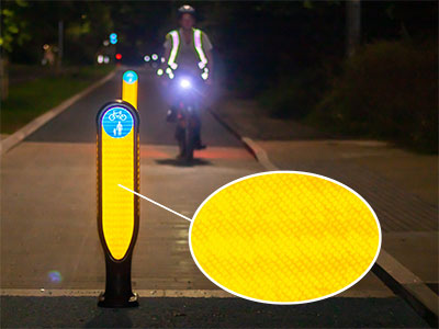 Cyclemaster™ Cycle Lane Bollard at night demonstrating high visibility of retroreflective panels.