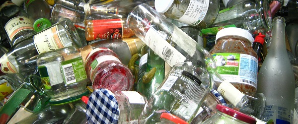 A collection of glass bottles and jars ready for recycling