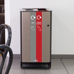 electra 60 recycling bin with dual grey can and red plastic bottle graphics in a commercial building