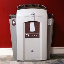 nexus 100 cup recycling station in a modern building with cup recycling graphics and side pods for general waste and liquid