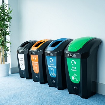 four nexus 30 recycling bins with different waste streams in a classroom