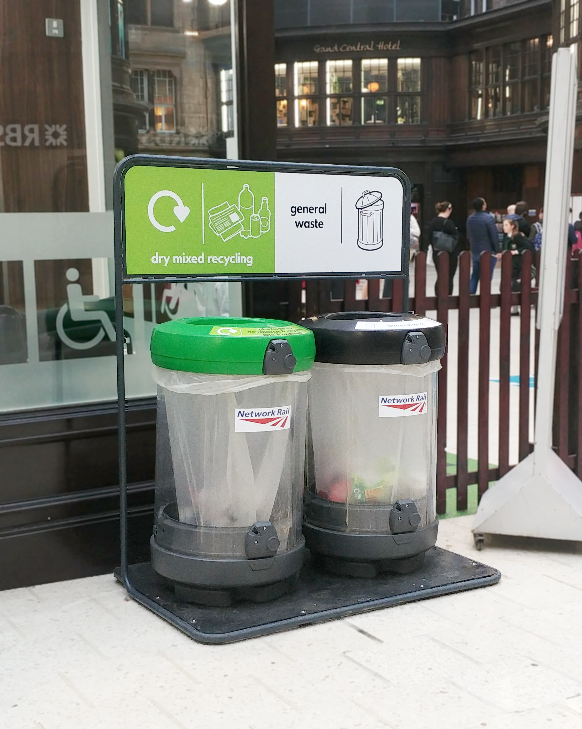 C-Thru™ 180 Recycling bins with personalised top aperture, front graphics and recycling stand